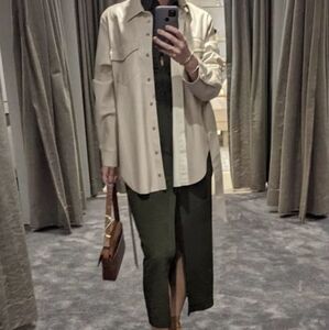 Nanushka Artha faux leather belted cream shirt jacket